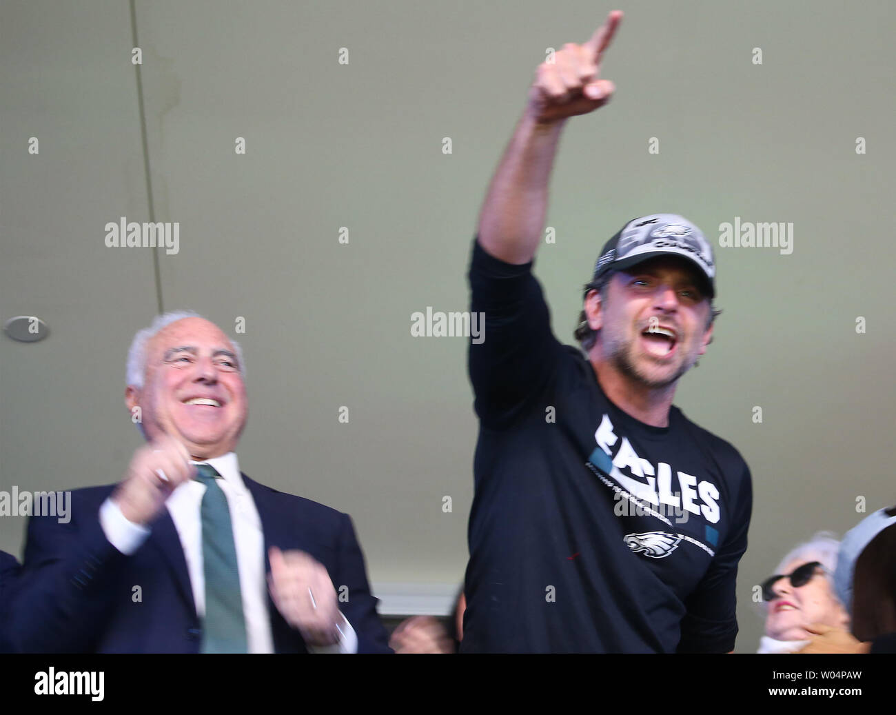 actor-bradley-cooper-r-reacts-alongside-philadelphia-eagles-owner-jeffery-lurie-during-the-super-bowl-lii-halftime-show-at-us-bank-stadium-in-minneapolis-minnesota-on-february-4-2018-the-eagles-wi.jpg