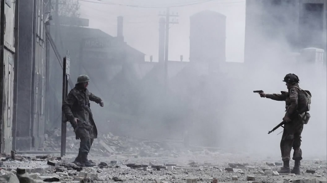 An Easy Company Paratrooper fires an M1911A1 at a Fallschirmjäger in Carentan (Ep.3)..jpg