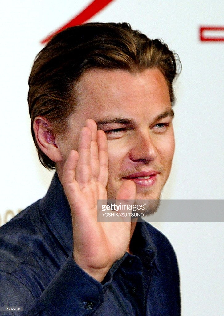 hollywood-actor-leonard-dicaprio-waves-to-reporters-after-a-press-to-picture-id51499840.jpg